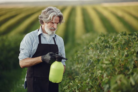 gardener tending to plants