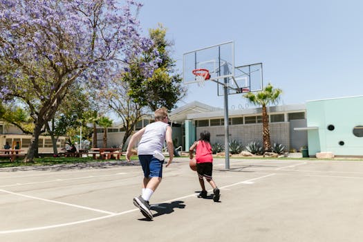 Urban park with children playing and trees