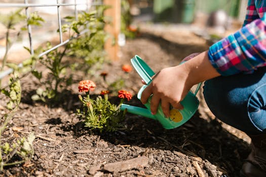 gardener planting flowers